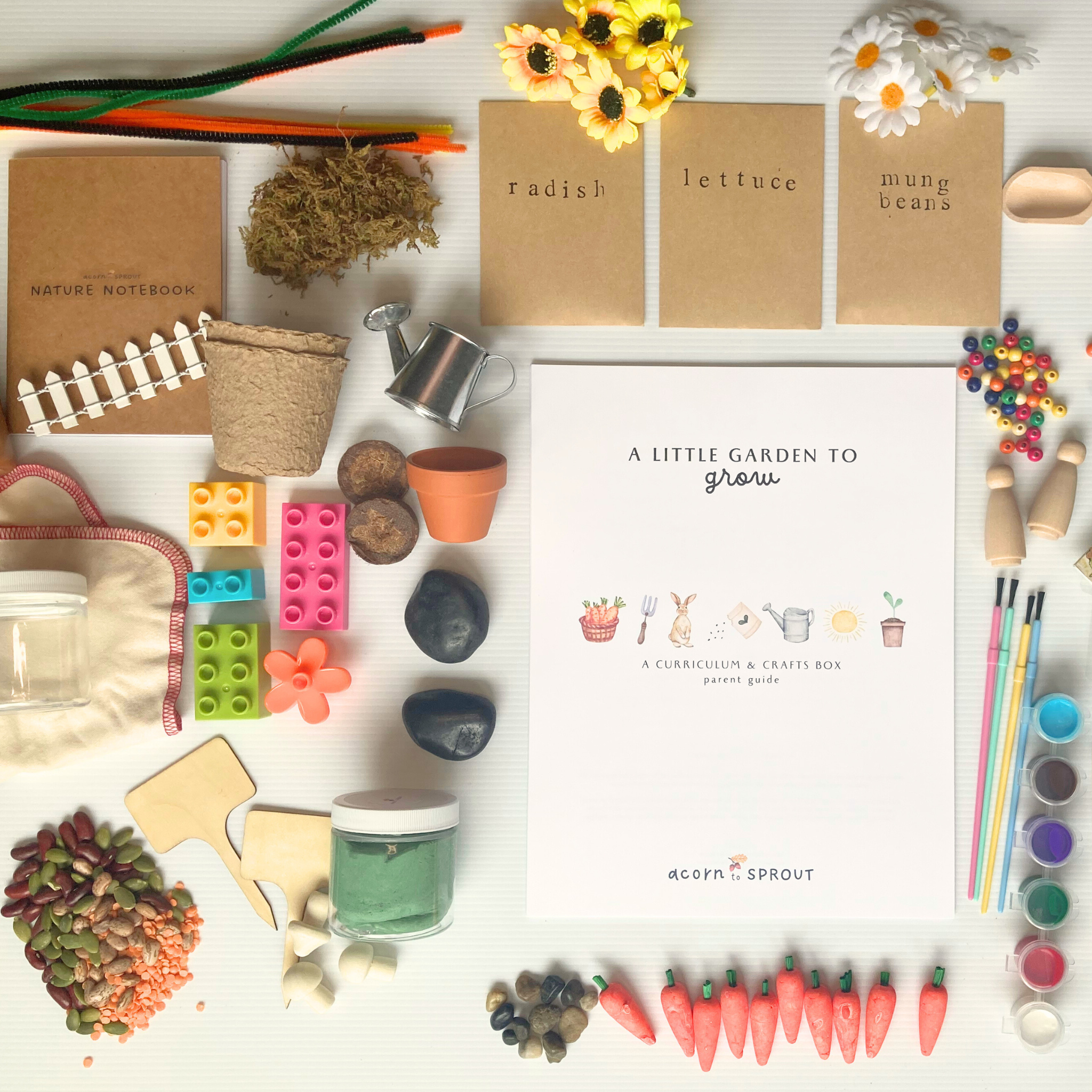Spring gardening nature-based open and go preschool homeschool curriculum box with all materials included in the box for hands on activities, independent play, and connection activities.