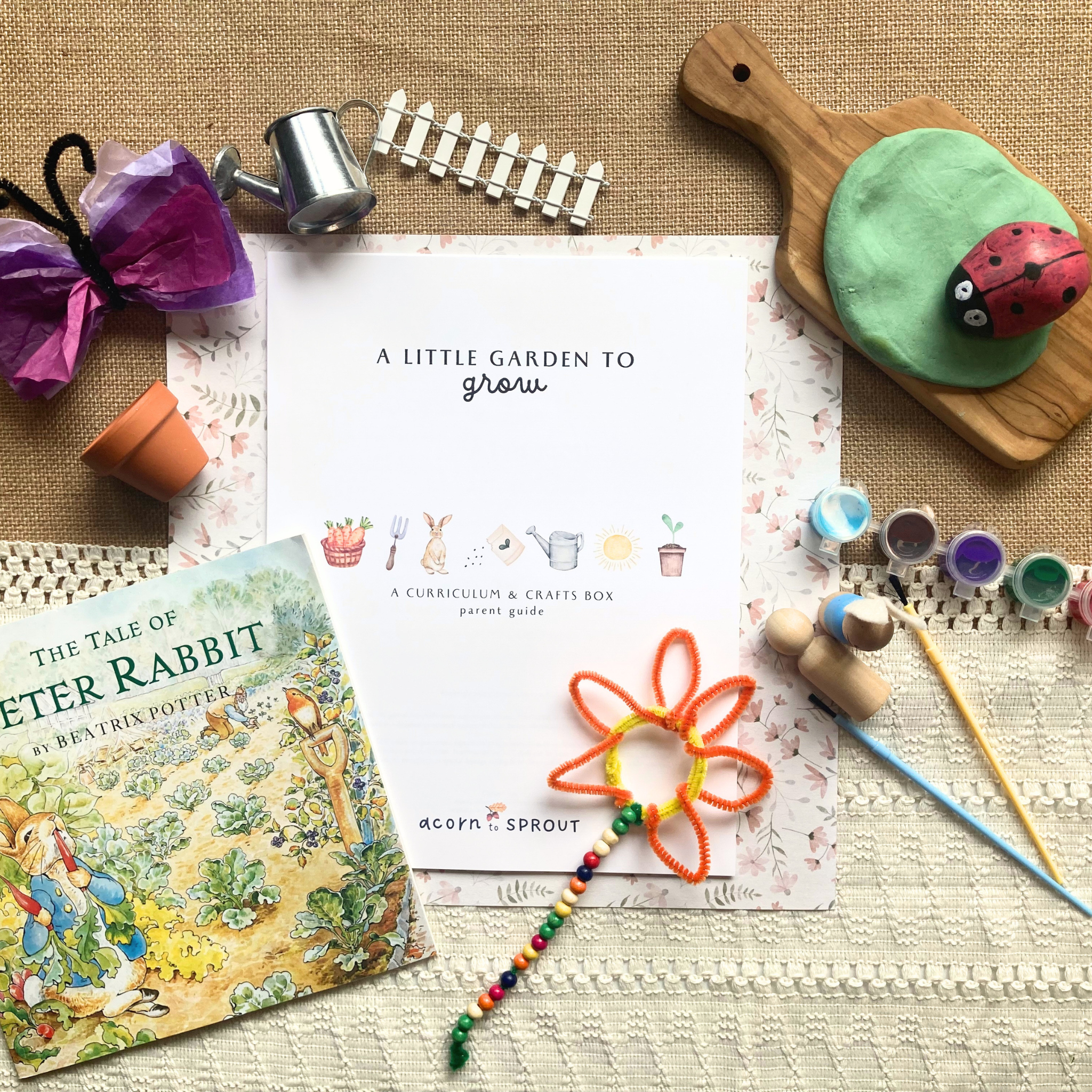 Spring gardening nature-based open and go preschool homeschool curriculum box with enough materials needed for mom and child to connect through hands on activities together as well as materials for independent play. for a work from home, busy mom.