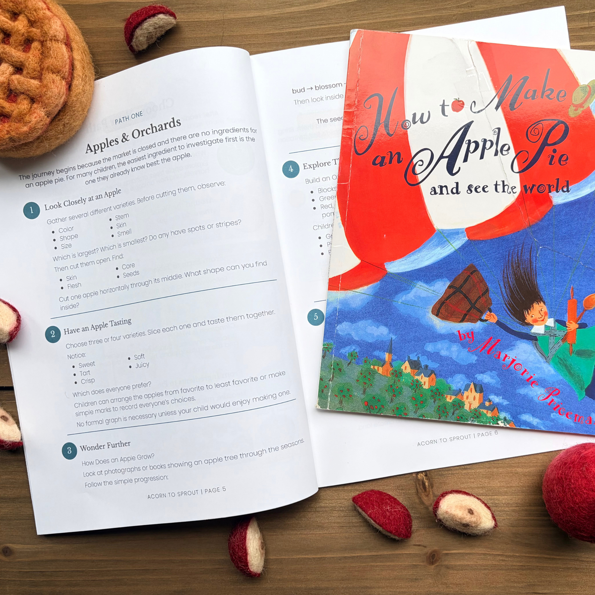 The Wonder Continues Unit Study guide open to Apples and Orchards week next to How to Make an Apple Pie and See the World
