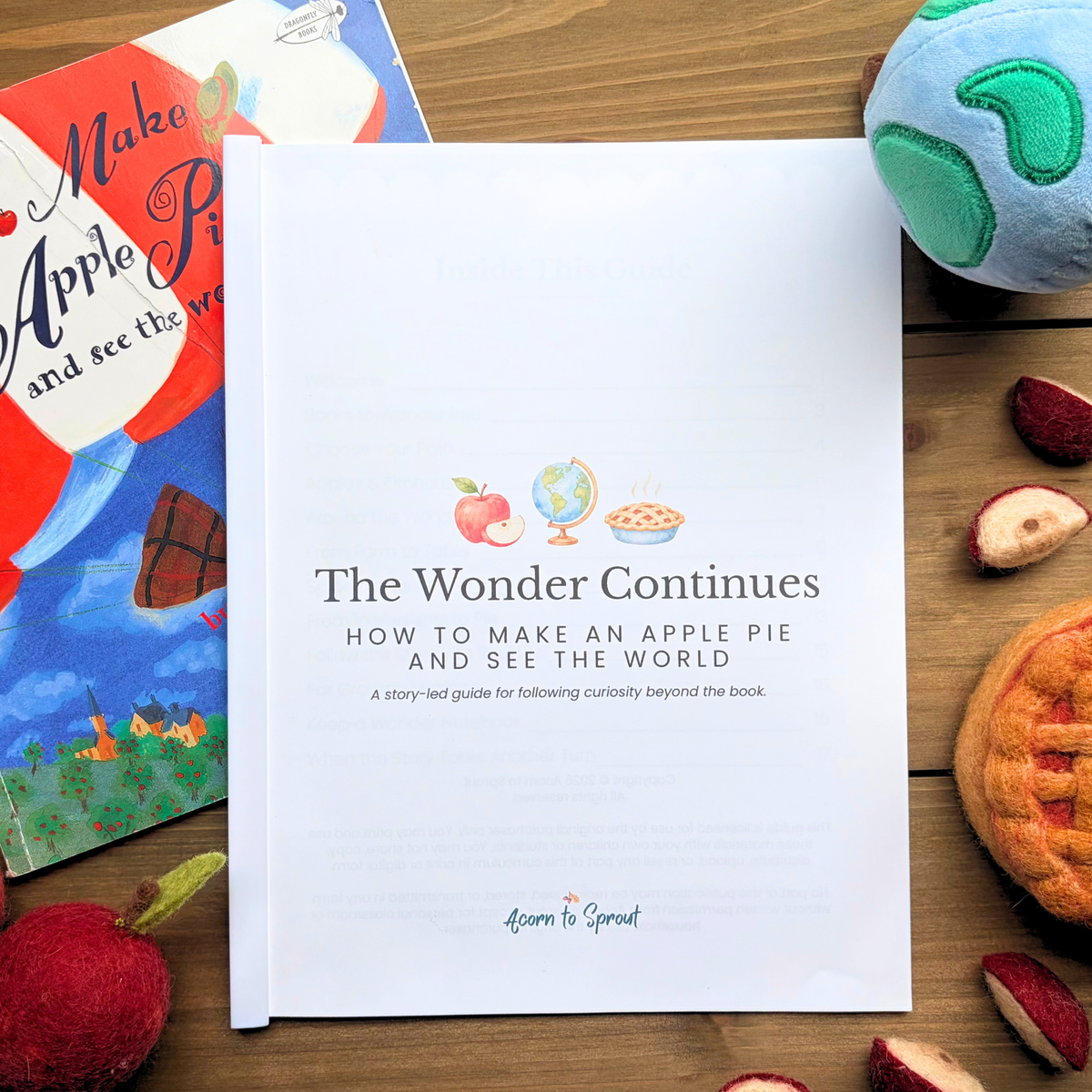The Wonder Continues Unit Study guide next to How to Make an Apple Pie and See the World