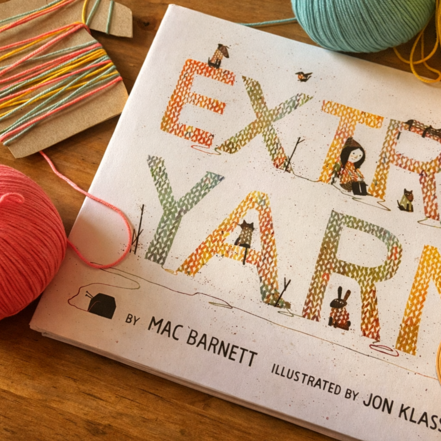 Extra Yarn by Mac Barnett paired with yarn and threading materials, encouraging fine motor skills through literature-based preschool play.