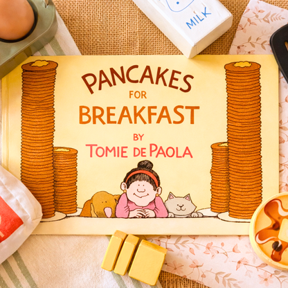Pancakes for Breakfast by Tomie dePaola styled with simple play materials for story-led preschool learning.