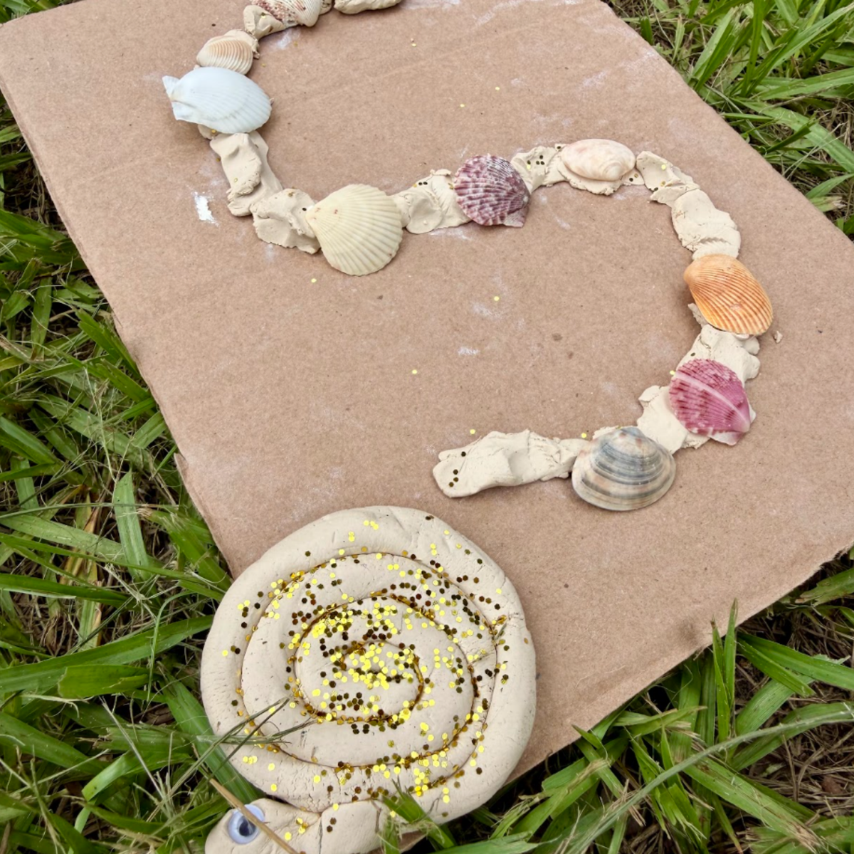 Seashell letter activity and playdough snail inspired by The Snail and the Whale.